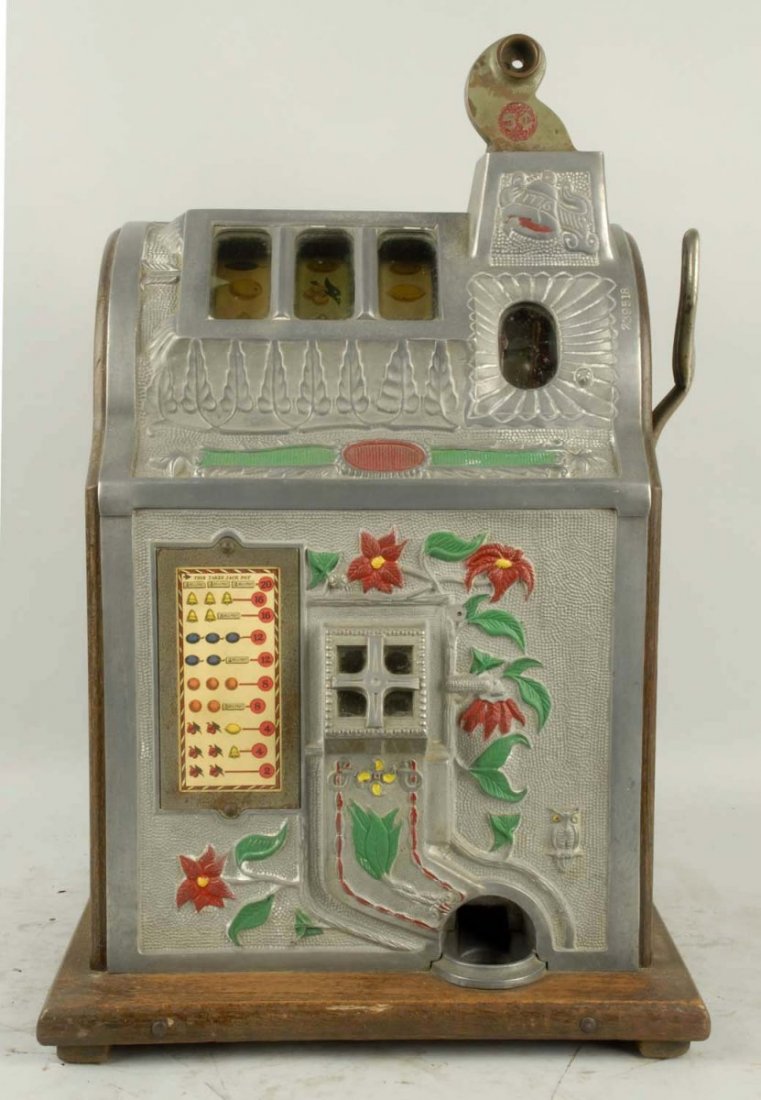 Mills 1929 5¢ Poinsetta Slot Machine.: New door, lock and cash box. Chip out of the mechanism sub base. Good original condition with some old repainting. Size 24" T.