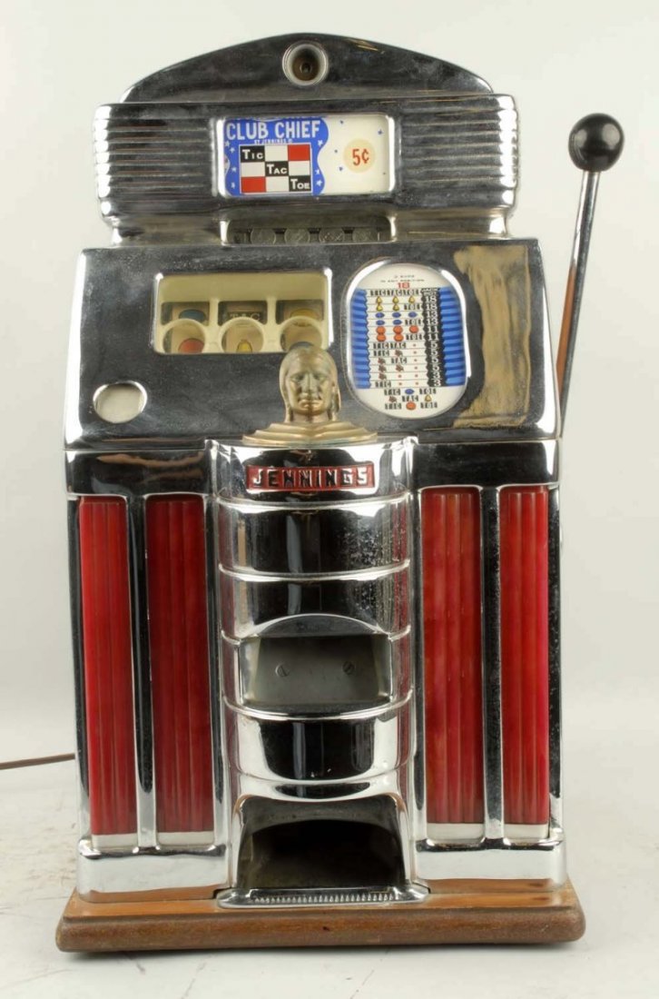 Jennings 1948 5¢ Sun Chief Light Up Slot Machine.: Tic-tac-toe. In original condition. Lights working. Original back door. Plays and pays. Condition (Good). Size 28" T.