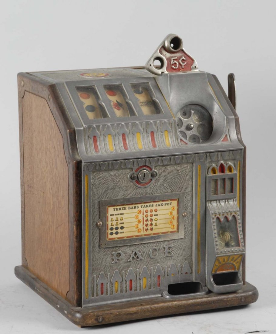 Pace Bantem 5¢ Slot Machine.: All original parts and finish. With original lock and paper strips. No key machine is locked. Condition (Excellent). Size 20" T.