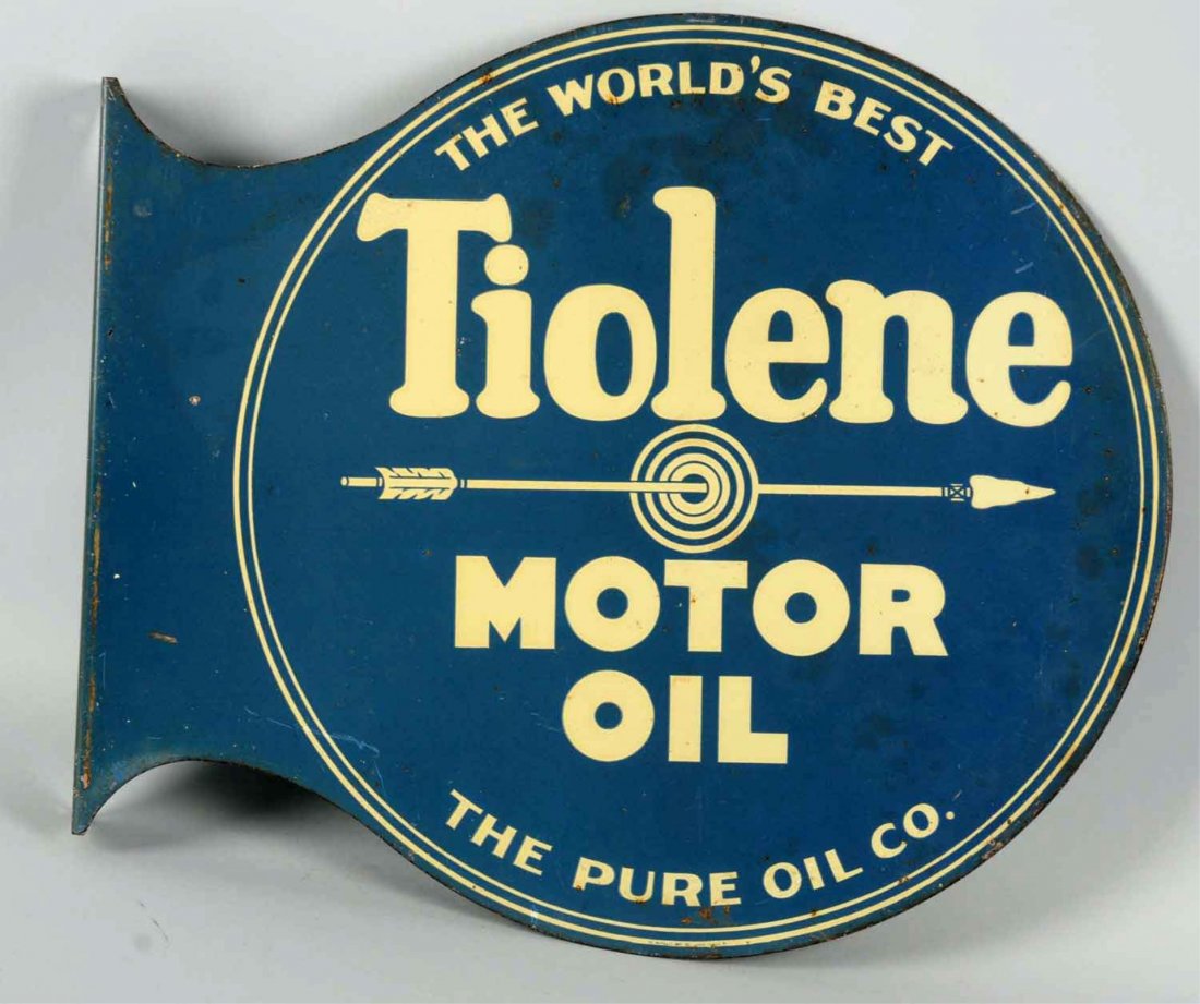 Tiolene Motor Oil Flange Sign.: Tin flange sign, has minor scratches and wear on display side, reverse side has more wear. Condition (8 & 7). Size 18" x 20".