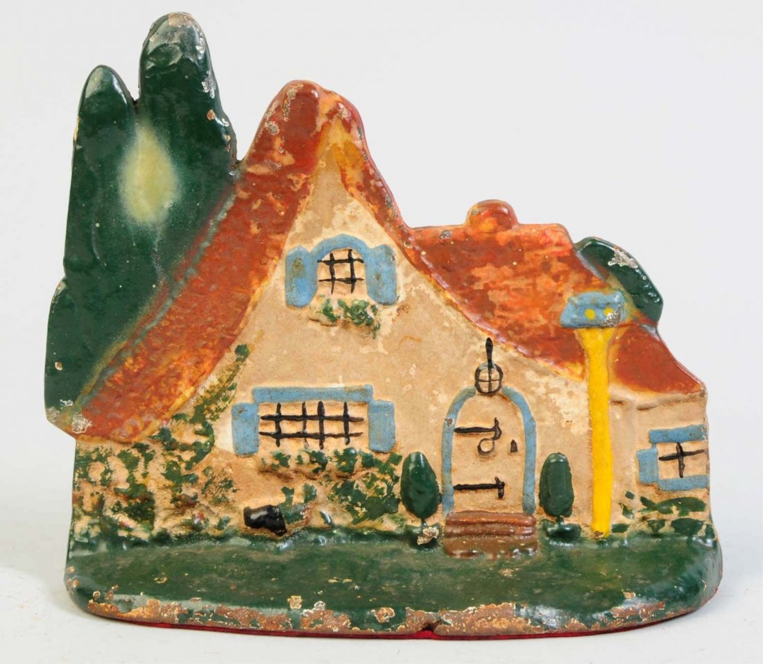 Cast Iron Cottage Doorstop.: Cottage with red roof. Made by Littco Products, Littlestown, PA. Condition (Very Good). Size 7 1/8" T.