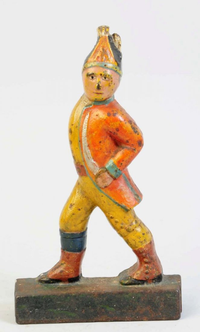 Cast Iron Hessian Soldier Doorstop.: Showing Hessian Soldier marching with head turned to the left. Made by Albany Foundry Co. Condition (Excellent). Size 10 3/4" T.