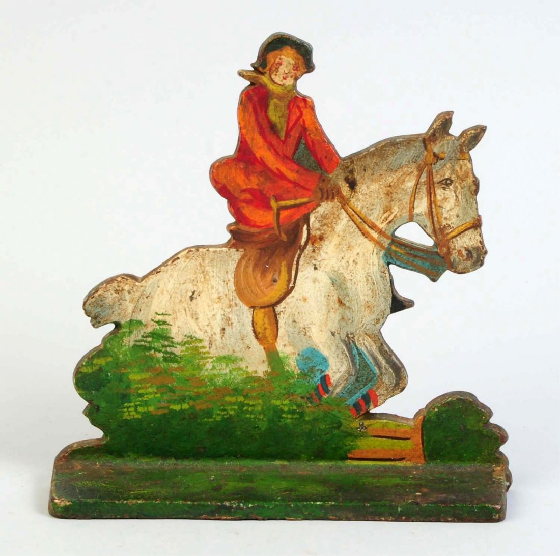 Cast Iron Lady Riding Sidesaddle Doorstop.: Lady riding sidesaddle in full hunting attire. Jumping horse over fence. National Foundry. Condition (Very Good). Size 7 1/4" T.