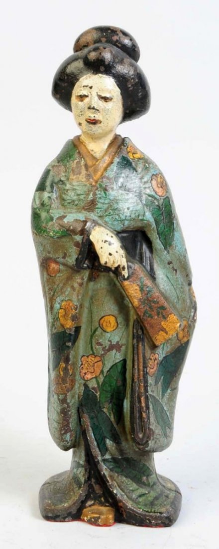 Cast Iron Geisha Doorstop.: Depicts Geisha girl wearing a Kimono. Full-figure casting with great detail to floral design. Made by Hubley. Condition (Excellent). Size 10 1/4" T.