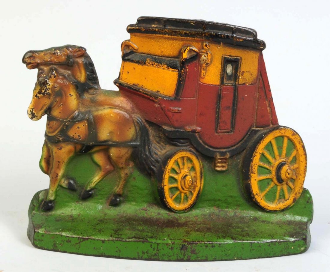 Cast Iron Stagecoach Doorstop.: Team of two horses pulling stagecoach. Marked, "Pat. Applied For". Condition (Excellent). Size 8 3/8" L.