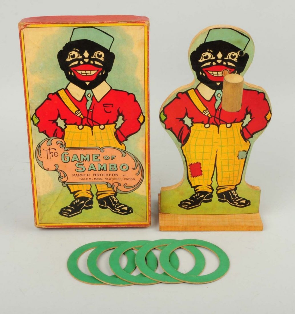 Parker Bros Game of Sambo.: Includes original box very colorful lid with depiction of African American man in clothing. Game itself has the wooden figure on base with a pipe and five original cardboard rings that are thrown and 