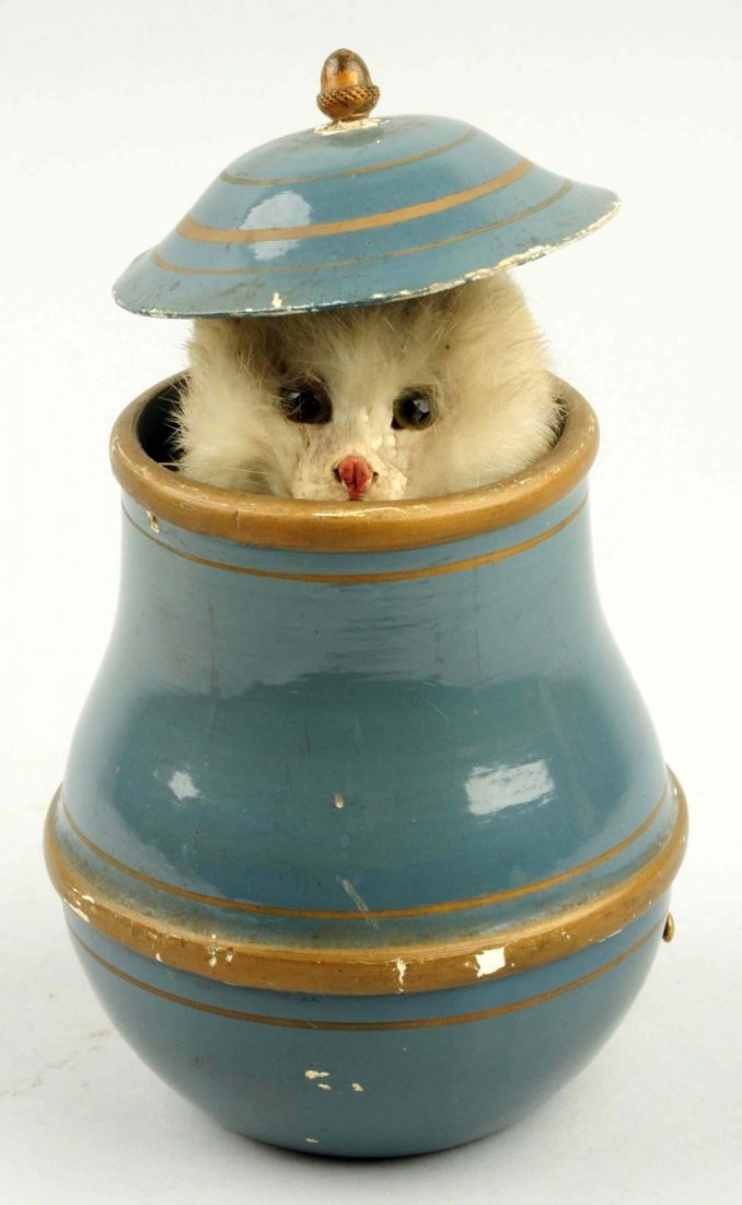 Cat in Kettle Mechanical Toy.: Wind-up mechanism. Cat moves up and down container. Possibly French. Condition (Excellent). Size 8 - 1/2" T.
