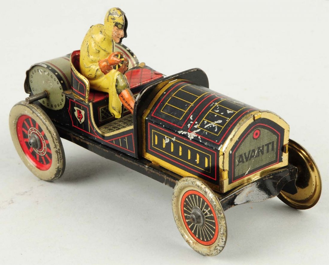 Hess Flywheel Race Car.: Made in Germany. It is an Avanti car. Car is all original including the driver. A nice early toy. Does have some chipping and scratching throughout. Condition (Very Good). Size 5" L.