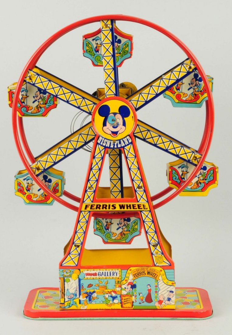 Chein Tin Litho Wind-up Walt Disney Ferris Wheel.: Nice lithography. Pictures of Mickey Mouse and Donald Duck on all carts. Mechanism needs repair. Very little wear. Only minor scratching. Condition (Excellent). Size 17" T.