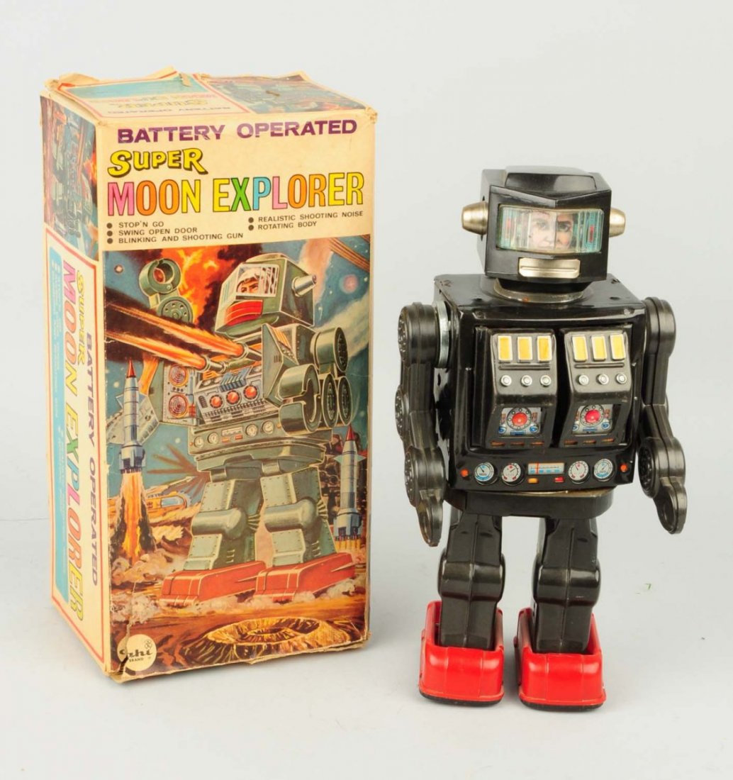 Japanese Super Moon Explorer Robot.: Battery Operated. Includes original box with original insert. Made by Ahi Japan. Box has tearing and creasing. When in operation chest opens guns stick out and fire. Condition (Very Good). Size 12" T.
