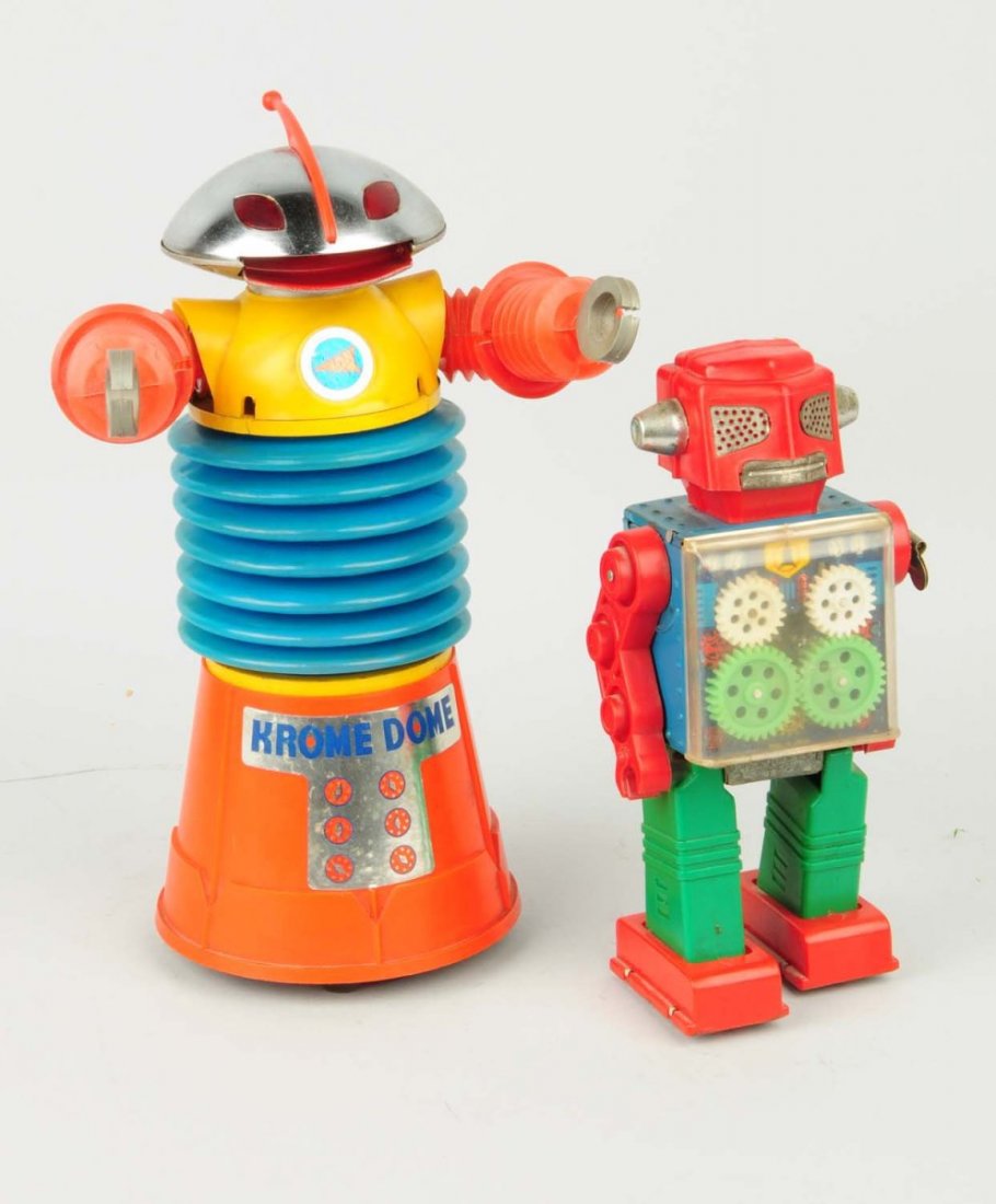 Lot of 2: Japanese Tin & Plastic Toy Robots.: Battery operated Krome Dome. Made by Yonesowa. Second one is a wind-up Gear robot. Some scratching to plastic chest protector but no cracking. Oxidation to bare metal parts. Condition (Very Good). Siz