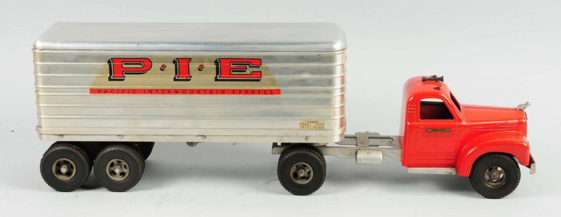 Smith-Miller Pacific Intermountain Express Truck.: Mack front. Cab of the truck has been restored. Trailer is original. Has a few minor chips throughout. Condition (Excellent). Size 27" L.