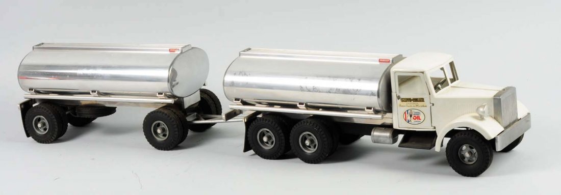 Smith-Miller Pressed Steel Tanker Truck.: with trailer. Truck is all original condition. Has a tank truck pulling a tank trailer. Has some chipping throughout. Condition (Excellent). Size 36" L.