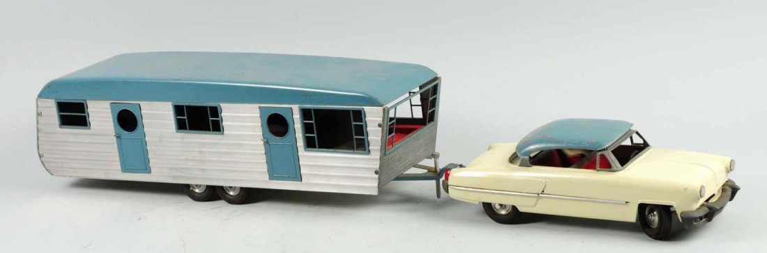 Smith-Miller Lucy Long-Long Trailer & Car.: Trailer is all original with no breaks or cracks. Does have some slight chipping and edge wear. Comes with original car. Body of the car has been repainted. Does have the original take off convertible