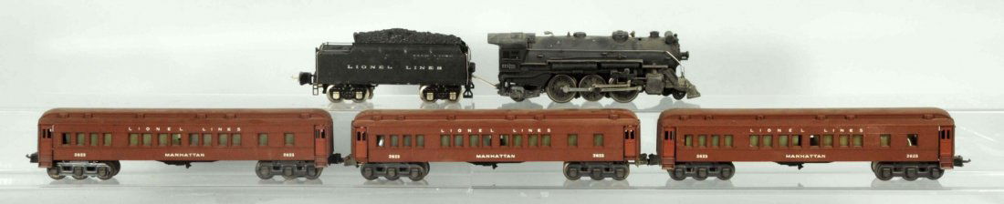 Lionel O Gauge No.225 Passenger Train Set.: Pre-war. Includes a set box marked No.846W. Set box is torn and missing some pieces. Includes No.225 Steam type locomotive, matching No.2245W tender and three Madison passenger cars. Three No.2623 Man