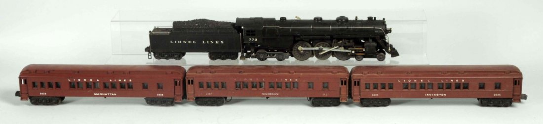 Lionel O Gauge No.773 Madison Passenger Car Set.: Pre-war. Includes No.773 Hudson style steam engine with matching No.2426W tender and three passenger cars. Passenger cars have individual boxes. One flap missing a couple of flaps detached but present