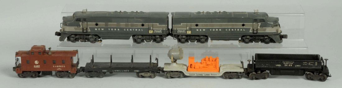 Lionel New York Central Freight Train Set.: Post war. O gauge. Includes No.2344 New York Central A and B units. With three freight cars and a caboose. Includes a No.3461 lumber car, No.6520 searchlight car. No.3469 dump car and a No.6457 caboos