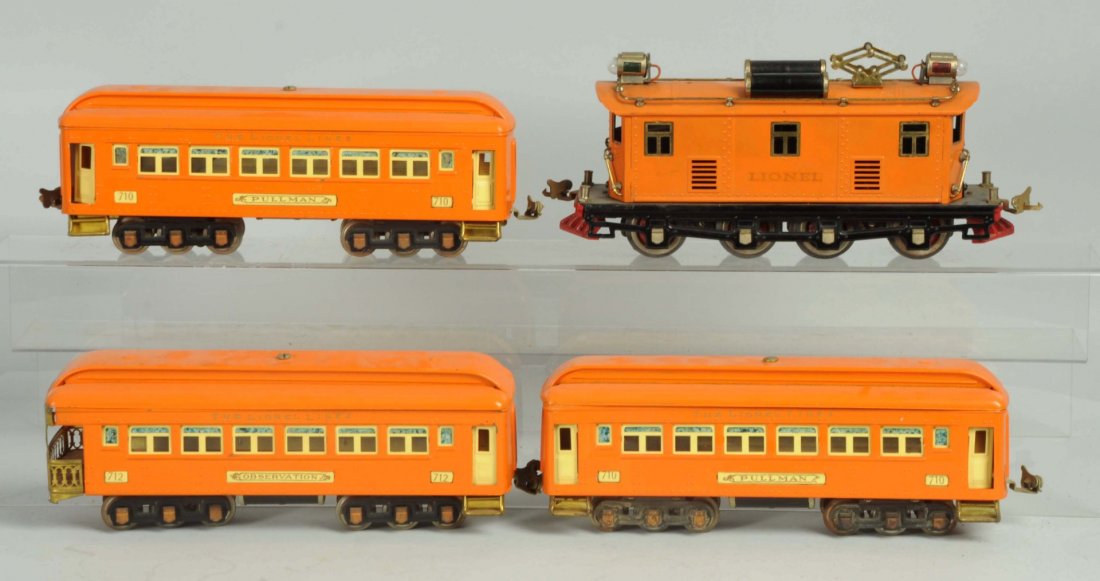 Lionel O Gauge No.256 Passenger Train Set.: Pre-war. Includes Lionel No.256 electric style engine with double motors and three 700 series passenger cars. Includes two No.710 pullman cars and one No.712 observation car. Wheels on engine are dama