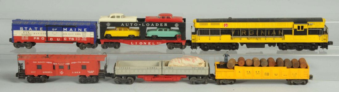 Lionel O Gauge No.2331 Virginian FM Freight Set.: Post war. Includes scarce No.2331 Virginian in black and yellow colors. There are cracks at both screw holes due to tightening. There is some oxidation and peeling on the side railings. Also comes wit