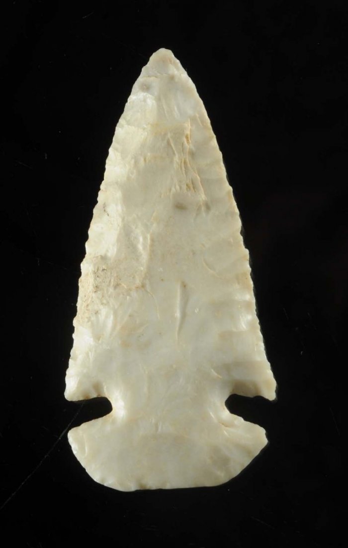 Dovetail / St. Charles Point.: Early Archaic 9500 - 8000 B.P. St. Clair Co., Illinois. Burlington Chert. The broad, heavily ground base suggest this point was much larger at one time. Made from a beautiful, glossy material with fin