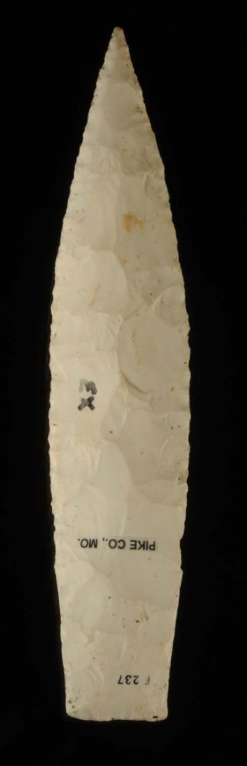 Sedalia Spear Point.: Mid-late archaic. 5,000-3,000 B.P. Pike County, Illinois. Burlington chert. Found by George Jennings. A huge and well-made example with a ground base and a perfect, sharp tip. Size L. 6 - 1/2" x W. 1 