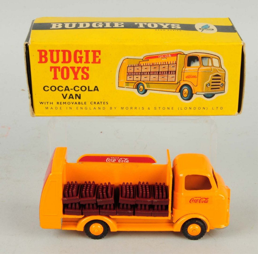 1950s Budgie Toys Coca-Cola Truck.: This Budgie Coca-Cola toy truck appears not to have been played with. It includes all 12 original mini plastic carriers as well. Excellent ox is also included. Condition (Excellent). Size Box: 5 - 3/4