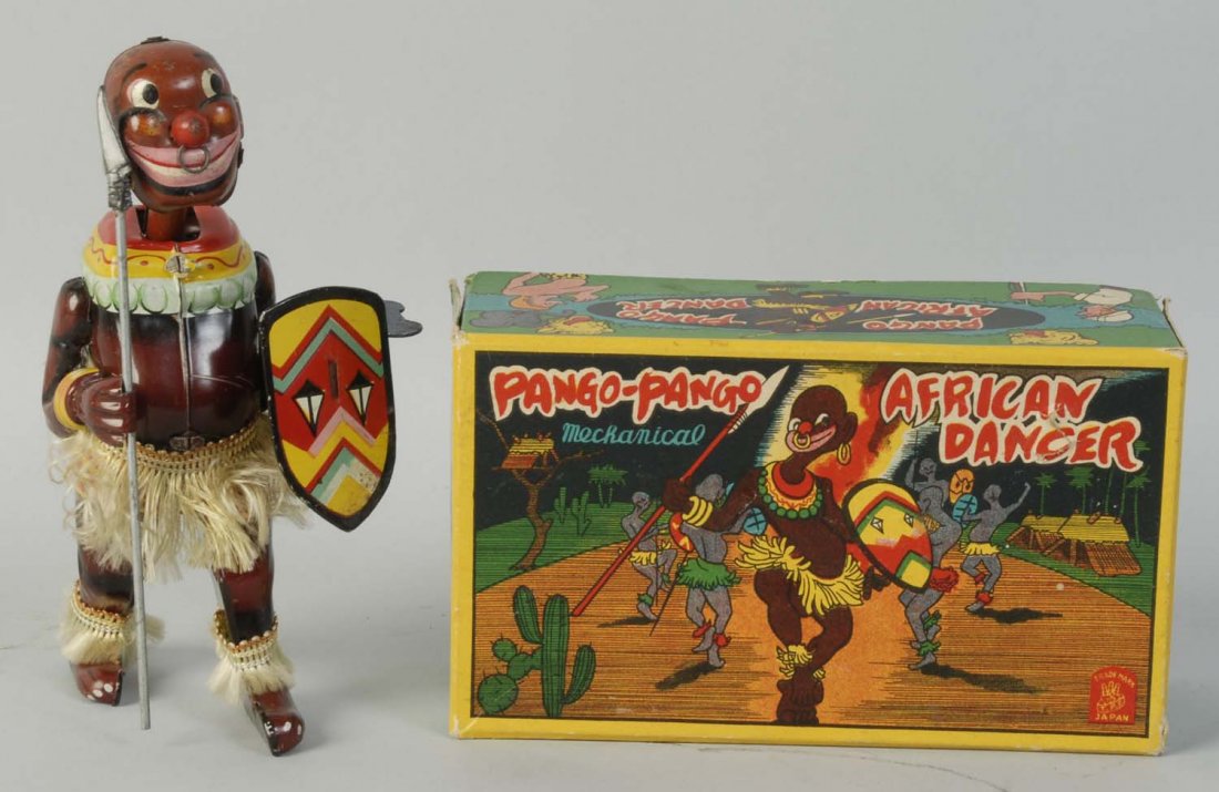 Japanese Tin Pango-Pango African Dancing Toy.: Wind-up toy. Includes colorful original box marked "TPS". Original rubber spear. Some scratching and wear to face. Condition (Very Good - Excellent).