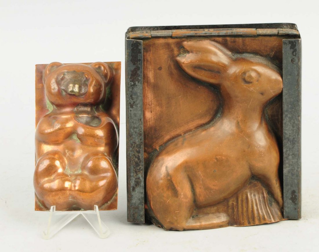 Lot of 2: Copper Chocolate Molds.: This lot includes copper mold depicting a bear cub and a other mold depicts a sitting rabbit. Condition (Very Good). Size Largest: 5 - 1/4" T.