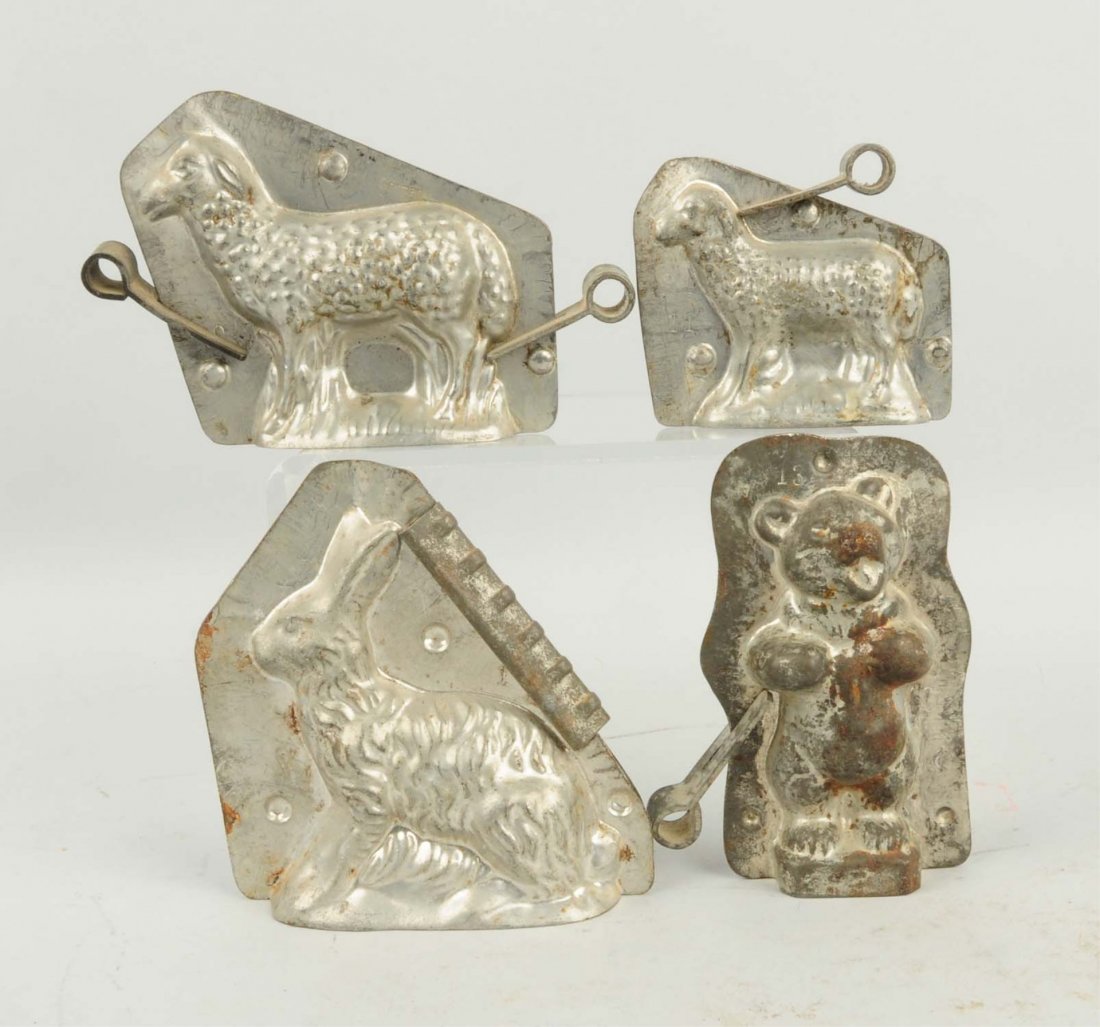 Lot of 4: Animal Chocolate Molds.: This lot includes two sheep, a rabbit and a standing bear. Condition (Very Good). Size Largest: 5" T.