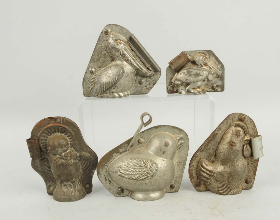 Lot of 5: Bird Chocolate Molds.: This lot includes two pelicans, a stylized rooster and two others. Condition (Very Good). Size Largest: 4 - 1/4" T.
