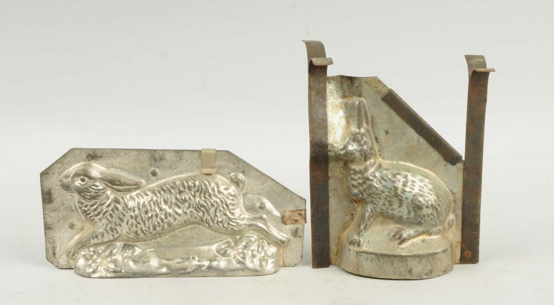 Lot of 2: Rabbit Chocolate Molds.: This lot includes a running rabbit and a sitting rabbit. Condition (Very Good). Size Largest: 9" L.