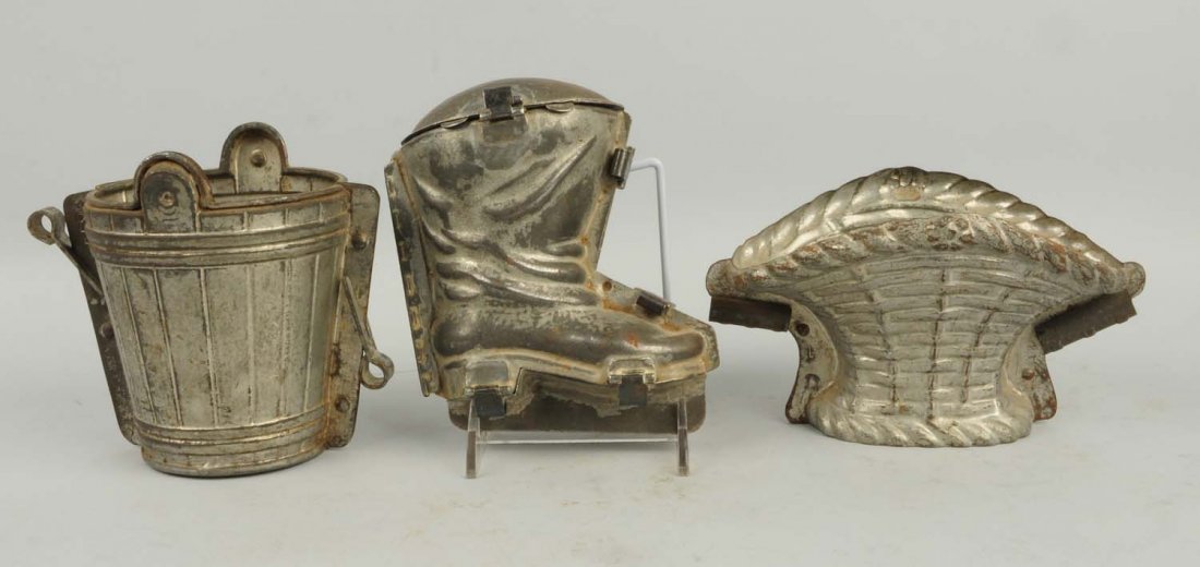 Lot of 3: Assorted Chocolate Candy Molds.: Includes a basket, a bucket, and a boot. Condition (Very Good). Size Largest: 6 - 1/4" T.