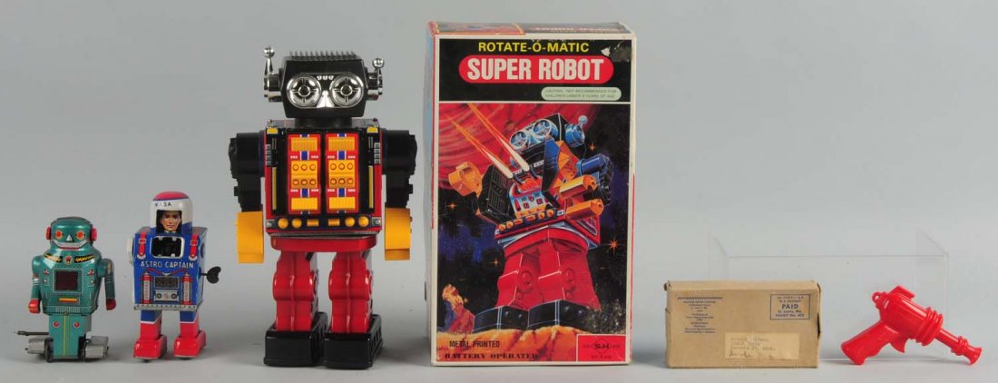 Lot of 4: Vintage Space Items.: Includes a battery operated super robot with the original box, Astro-Caption which is missing one arm, a small wind-up Roller Robot, and a Ralston Purina space patrol gun premium in original box. Cond