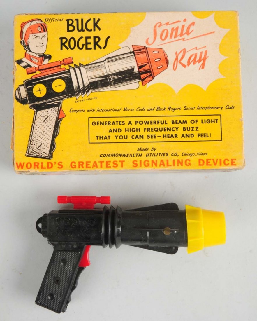 Buck Rogers Sonic Ray Pistol.: Made by Commonwealth Utilities Co. Includes original box. Some wear to box. Plastic. Missing inside lense. Comes with a top secret cipher booklet. Condition (Very Good). Size Box: 8 - 1/2" x 6".