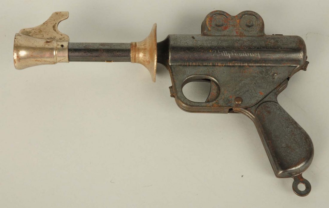 Vintage Buck Rogers 25th Century Daisy Pistol.: Still works well but does have some pitting and oxidation throughout. Condition (Good - Very Good). Size 9 - 1/2" L.