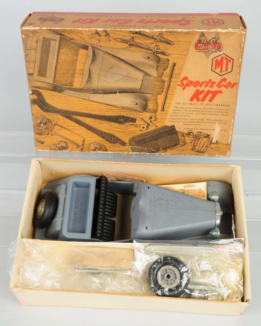 Vintage Doepke Model Toys Sports Car Kit.: Kit appears to be unbuilt and mostly complete in original box. Box does have some tearing and creasing. Condition (Very Good). Size Box: 15" x 9 - 3/4".