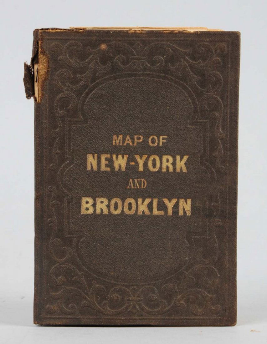 1869 Sectional Folding Map of New York & Brooklyn: This map is in very nice condition. The inside of the front cover does have some staining but the map itself is very clean and appears to be free of any tears. Condition (Very Good). Size 5" L