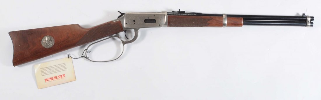 John Wayne Winchester 94 .30-.30 Cal. Rifle.**: Serial No. JW10728. Barrel length 18". Lever action. With box.Condition (Excellent).