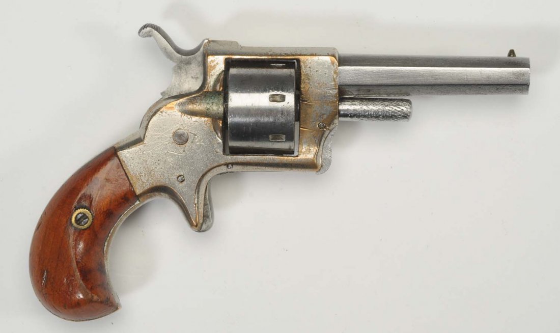 E.A. Prescott Pocket Revolver Spur Trigger.: Unmarked E. A. Prescott .22 cal. pocket revolver in very good condition with nickel finish over brass frame and walnut grips. Overall length 5 - ½” and barrel length 2 - ½”. UPDATE/CORRECTION: W