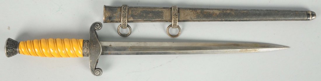 WWII German Army Dagger.: German Army Nazi era officers dagger in very good condition. Marked Alcoso Solingen on the blade, yellow grips with good engraving detail and correct metal double ring scabbard. Nice example of Heer o