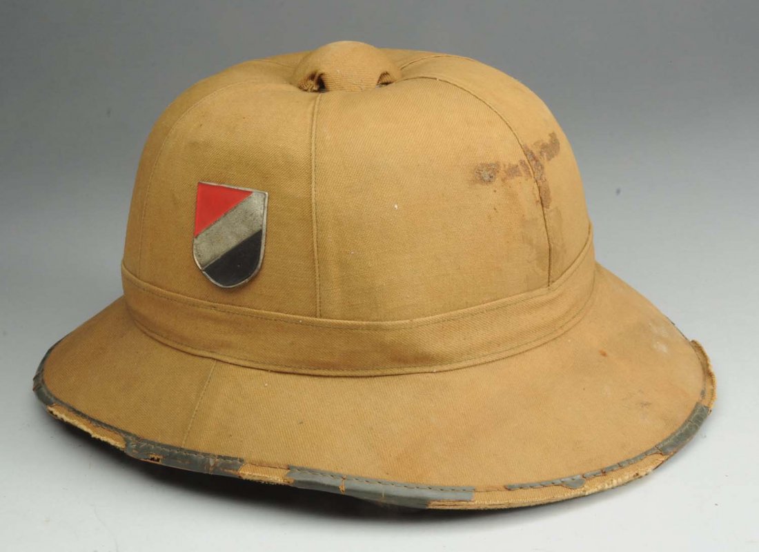 German WWII African Core Sun Helmet.: With insignia apparently reapplied post war but original. Imported to the US made in Germany.