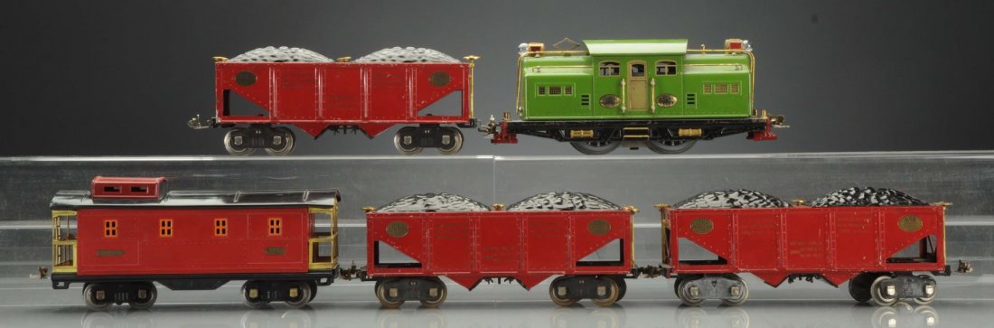 Lionel 318 Almost Coal Train Set.: Std Gauge. No. 318 is green colored and has been rewheeled a long time ago, otherwise it is complete and all original. It has a small dent on the roof, some scratches, and paint chips. It comes with t