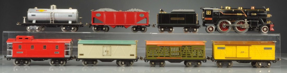 Lionel 390 Steam Locomotive Engine & Tender.: Locomotive has a Build-A-Loco motor in it. It is very clean, attractive, complete, and all original. No.384T tender's back up light at rear of tender is not original. No.390 includes it's original box