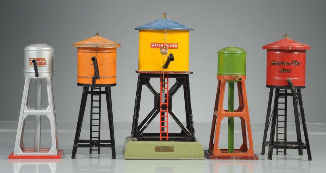 Grouping of Water Towers.: Includes Ives, American Flyer and Lionel. Large Ives water tower is original and has significant paint loss on the red deck and on the super structure. There are many other paint chips and scratches t
