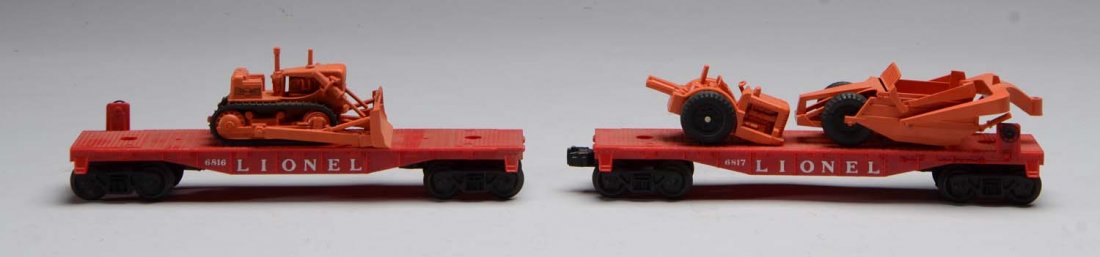 Lot of 2: Lionel Post-War Specialty Cars.: No. 6816 flat car with original bulldozer. and No. 6817 flatcar with an earth scraper. Both are scarce. Has original boxes. Condition (Very Good).