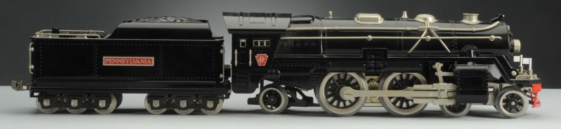 MTH No. 392 Standard Gauge Engine & Tender.: It includes black No. 392E which is complete, all original, very clean, attractive, and in an excellent condition; Twelve wheel PRR tender is complete, all original, and in an excellent condition.