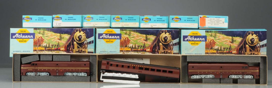 11Pc. Athern HO Scale Train Kits.: Six piece PRR passenger set includes one baggage car kit, one observation car kit, one coach kit, one RPO kit, one diner, one powered Alco A unit, one dummy Alco B unit, one Lackawanna Phoebe snow box