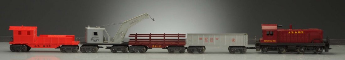 Marx 33412 1998 Santa Fe Diesel Switcher Set.: The locomotive is complete and all original. There is slight wear to Santa Fe lettering on one side. No.347100 PRR gondola is complete and all original. Santa Fe work caboose no number is complete and