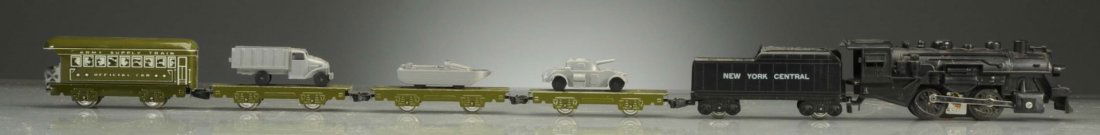Marx Boxed Set 4065.: Set comes with track, transformer, and a pup tent. Extra Army truck is missing rear wheels. Also includes No.400 steam locomotive, NYC four wheel plastic, six inch tin Army flat with plastic armored c