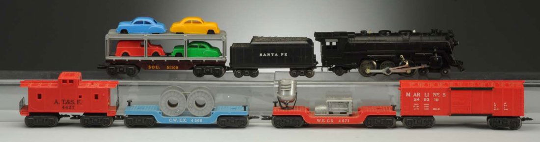 Marx Western Electric Train Set No. 55925.: Set includes No. 249319 red boxcar which is complete, all original, and in a like new condition; No. 51100 southern auto loader which is complete, all original, and in a like new condition; Santa Fe p